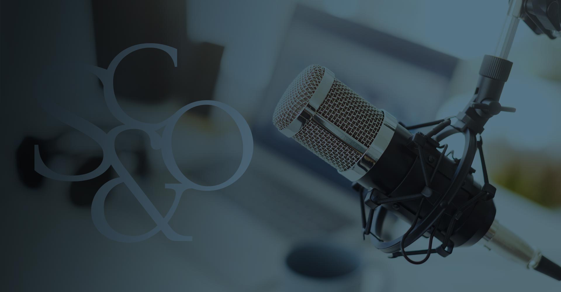 SykesPodcastHeader Photo of microphone with Sykes & Company, P.A. logo